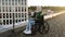 Muslim wheelchair user spending morning on flat roof