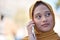 Muslim woman in city on a phone call, cellphone communication or 5g International update, news or conversation. Young