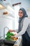 muslim woman friend preparing some food for dinner