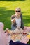 Muslim woman having yummy lunch outside with friend