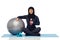 Muslim woman in hijab with fitness ball and bottle