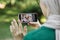 Muslim woman in hijab having video call with her grandmother and grandfather