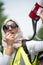 Muslim woman with megaphone at the counter-demo by pressure group Unite Against Fascism in Whitehall, London, UK.