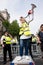 Muslim woman with megaphone at the counter-demo by pressure group Unite Against Fascism in Whitehall, London, UK.