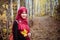 Muslim woman in North America during autumn