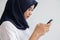 Muslim woman online  payments app smartphone :Transaction with financial security systems, communication commerce with technology