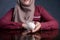 Muslim Woman with Piggy Bank, Saving Investment Concept
