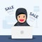 Muslim Woman sit front computer shopping online sale product at home