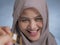 Muslim Woman Smiling When Receiving Credit Card