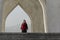 Muslim woman walking under Azadi tower formerly known as the Shahyad tower is a monument