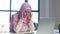 Muslim woman wearing hijab using laptop at office