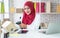 Muslim woman who owns a business, She inspects the product before sending the parcel for delivery to customers online.