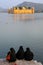 Muslim women sitting on the shore of Man Sagar Lake in Jaipur