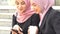 Muslim women using smart phone