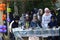 Muslim women wearing hijabs sitting at the table served with dishes