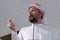 Muslims young arabic Imam has a speech on friday afternoon prayer in mosque. Muslims have gathered for the friday afternoon prayer