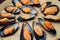 Mussels in the bowl with parsley branch.