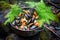 mussels in a pot over a campfire, surrounded by nature