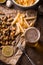 Mussels, potatoes on parchment and beer in a glass top view