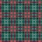 Muted green and red tartan plaid