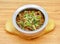 Mutton boneless handi served in a dish isolated on grey background side view of indian, pakistani food