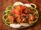 Mutton fry or Lamb fry, spicy and delicious dish served over a rustic wooden background, selective focus