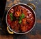 Mutton Rogan josh karahi served in a dish isolated on dark background top view