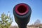 The muzzle of the cannon, photographed in close-up.