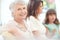 My girls, my treasures. Portrait of an elderly woman spending time with her daughter and granddaughter at home.