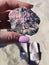 My Hands Holding a Rhodonite Gemstone Raw Gems Stones Rocks Nails BOHO Beach Lotus Ring