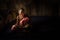 Myanmar - December 5, 2016:Little Novice Monk are reading the book in the cubicle of temple with window light, Mandalay