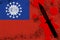 Myanmar flag and black tactical knife in red blood. Concept for terror attack or military operations with lethal outcome