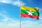 Myanmar flag waving with sky on background realistic 3d illustration