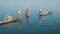 Myanmar, Inle Lake. Fishermen on boats with traditional traps