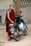 Myanmar monk with motorbike