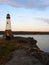 Myers Park lighthouse peninsula Cayuga Lake at moonset