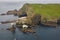 Mykines lighthouse and cliffs on Faroe islands from helicopter