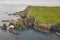 Mykines lighthouse and cliffs on Faroe islands from helicopter