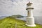 Mykines lighthouse and cliffs on Faroe islands. Hiking landmark