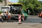 MYKOLAIV, UKRAINE - AUGUST 04, 2021: Workers with road repair machinery laying  asphalt