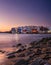 Mykonos, Greece. View of a traditional house in Mykonos. The area of Little Venice. Seascape during sunset. Sea shore and beach.