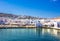 Mykonos port with boats and windmills, Cyclades islands.
