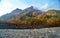 Myojin bridge and Azusa river in late autumn at Kamikochi National Park, Matsumoto, Nagano, Japan