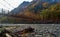 Myojin bridge and Azusa river in late autumn at Kamikochi National Park, Matsumoto, Nagano, Japan