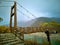 Myojin bridge and Azusa river in late autumn at Kamikochi National Park, Matsumoto, Nagano, Japan