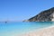 The Myrthos beach with little white stones and crystal clear waters blue