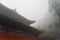 The mysterious ancient building complex of Wudang Mountain in the fog.