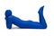 Mysterious blue man in blue suit lying on the floor