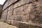 mysterious carved symbols on ancient city walls