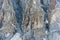 Mysterious caves on the steep slope of the mountain, Nepal.